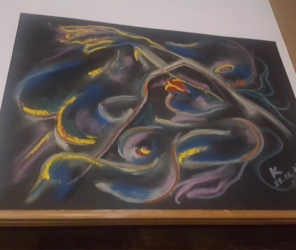 Ensemble, amour forme imbriqués couleurs contraste sur papier noir craies couple sexe