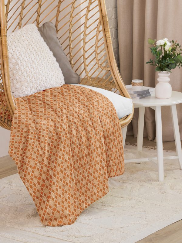 Couverture Sherpa Bresca, en polyester, pour un confort ultime et une chaleur inégalée. Un motif inspiré des nids d'abeilles, doux et élégant.